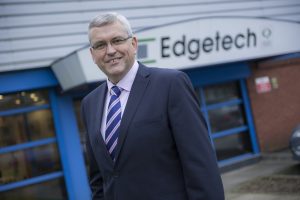 Chris Alderson outside Edgetech HQ PRESS