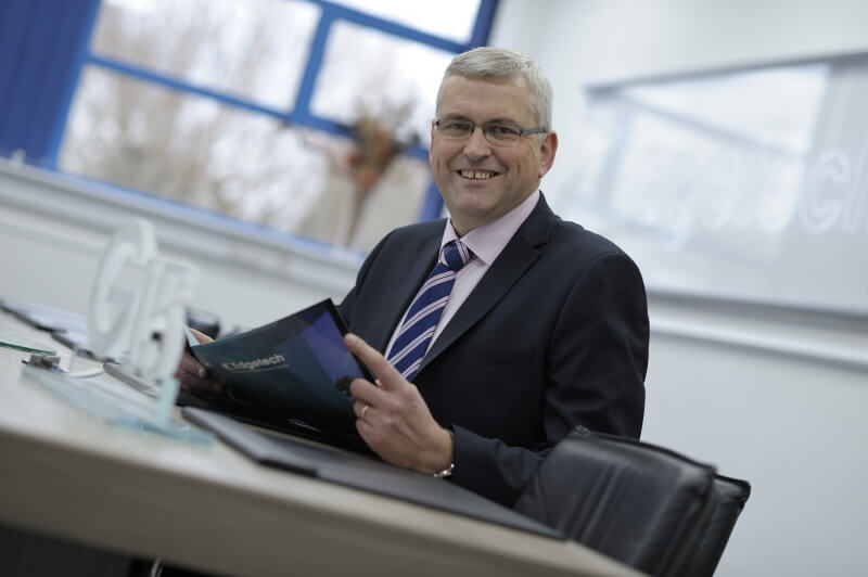 Edgetech's Managing Director Chris Alderson sat at his desk.